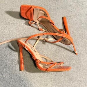Orange‎ crocodile embossed high heels